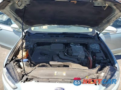 Zdjęcie 11 z 12 samochodu: 2014 FORD FUSION SE HYBRID VIN:3FA6P0LUXER179326 - miniatura