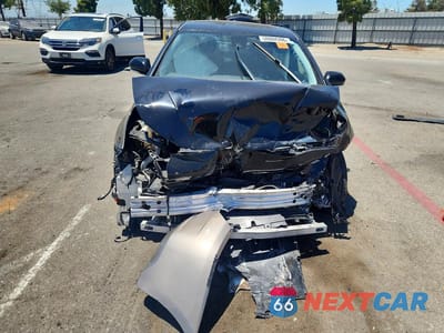 Piąte zdjęcie samochodu w środku: 2017 TOYOTA PRIUS TWO VIN:JTDKBRFU4H3053912 - miniatura