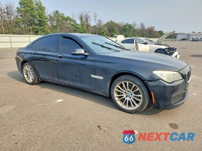 Czwarte zdjęcie samochodu z boku: 2015 BMW 740 I VIN:WBAYA6C53FG273294 - miniatura