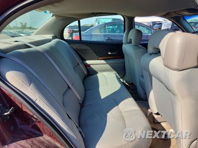 Zdjęcie 10 z 12 samochodu: 2004 BUICK LESABRE CUSTOM VIN:1G4HP52K54U104245 - miniatura