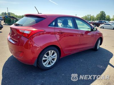 Trzecie zdjęcie samochodu z tyłu: 2014 HYUNDAI ELANTRA GT BASE VIN:KMHD35LH6EU174223 - miniatura