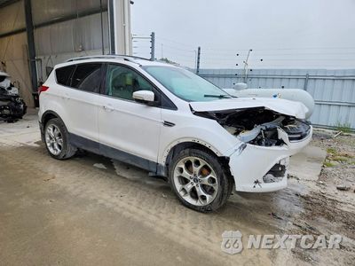 Czwarte zdjęcie samochodu z boku: 2014 FORD ESCAPE TITANIUM VIN:1FMCU0JXXEUC65758 - miniatura