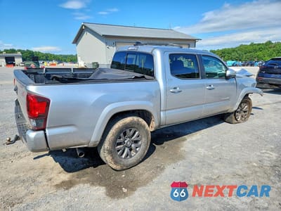 Trzecie zdjęcie samochodu z tyłu: 2023 TOYOTA TACOMA SR5 V6 VIN:3TMCZ5AN3PM609990 - miniatura