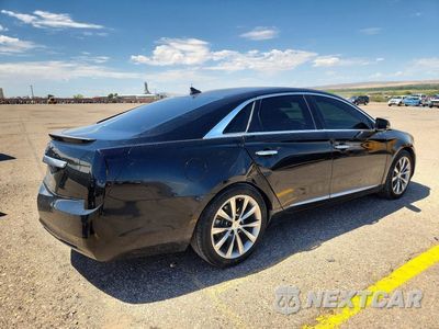 Trzecie zdjęcie samochodu z tyłu: 2014 CADILLAC XTS VIN:2G61L5S3XE9176005 - miniatura