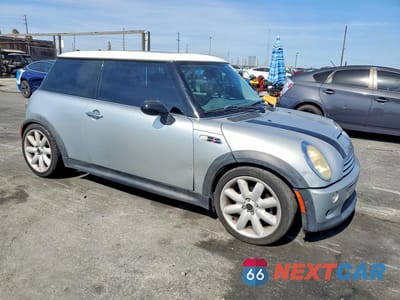 Czwarte zdjęcie samochodu z boku: 2002 MINI COOPER S VIN:WMWRE33482TD56996 - miniatura