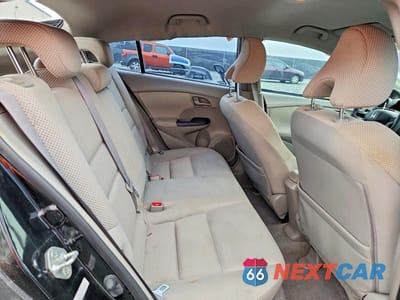 Zdjęcie 10 z 13 samochodu: 2010 HONDA INSIGHT EX VIN:JHMZE2H70AS028469 - miniatura