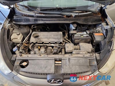 Zdjęcie 12 z 13 samochodu: 2011 HYUNDAI TUCSON GLS VIN:KM8JU3AC0BU293022 - miniatura