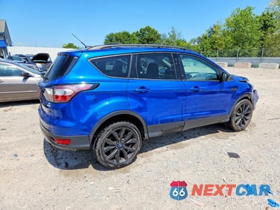 Trzecie zdjęcie samochodu z tyłu: 2017 FORD ESCAPE SE VIN:1FMCU0GD7HUD37663 - miniatura