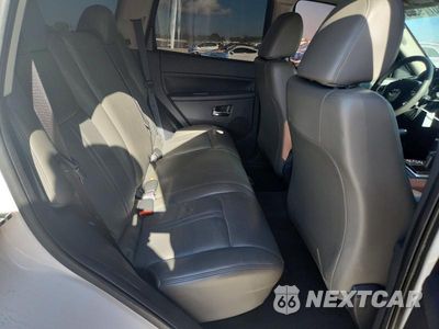 Zdjęcie 11 z 14 samochodu: 2010 JEEP GRAND CHEROKEE LARED VIN:1J4PR4GK2AC150592 - miniatura