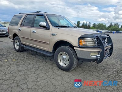 Czwarte zdjęcie samochodu z boku: 1998 FORD EXPEDITION VIN:1FMRU18W5WLA99816 - miniatura