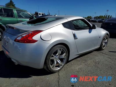 Trzecie zdjęcie samochodu z tyłu: 2009 NISSAN 370Z BASE VIN:JN1AZ44E99M402681 - miniatura