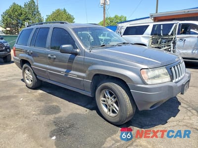 Czwarte zdjęcie samochodu z boku: 2004 JEEP GRAND CHEROKEE LAREDO VIN:1J4GW48S04C331184 - miniatura