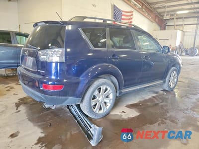 Trzecie zdjęcie samochodu z tyłu: 2010 MITSUBISHI OUTLANDER SE VIN:JA4JT3AW7AZ015196 - miniatura