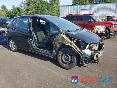 Czwarte zdjęcie samochodu z boku: 2017 HONDA FIT LX VIN:3HGGK5H56HM710990 - miniatura
