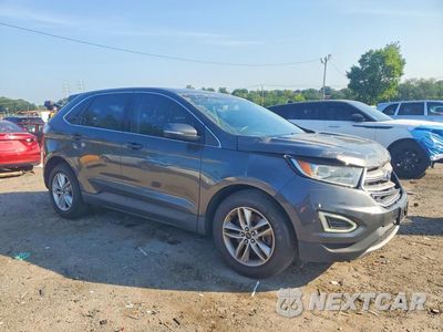 Czwarte zdjęcie samochodu z boku: 2015 FORD EDGE SEL VIN:2FMTK4J94FBC37556 - miniatura