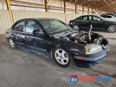 Czwarte zdjęcie samochodu z boku: 2004 HYUNDAI ELANTRA GLS VIN:KMHDN46D84U916245 - miniatura