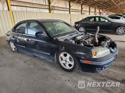 Czwarte zdjęcie samochodu z boku: 2004 HYUNDAI ELANTRA GLS VIN:KMHDN46D84U916245 - miniatura