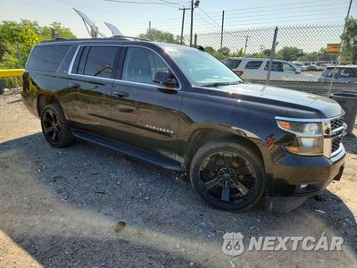 Czwarte zdjęcie samochodu z boku: 2020 CHEVROLET SUBURBAN K1500 LT VIN:1GNSKHKC6LR136598 - miniatura