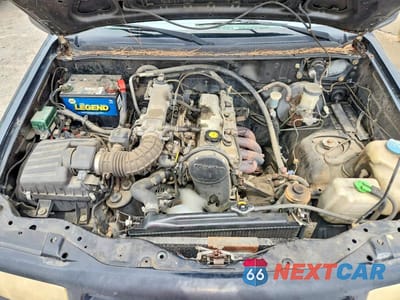 Zdjęcie 12 z 13 samochodu: 1999 CHEVROLET TRACKER VIN:2CNBE1867X6929902 - miniatura