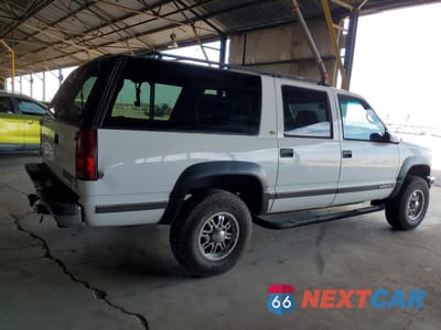 Trzecie zdjęcie samochodu z tyłu: 1999 CHEVROLET SUBURBAN K2500 VIN:3GNGK26F7XG106751 - miniatura