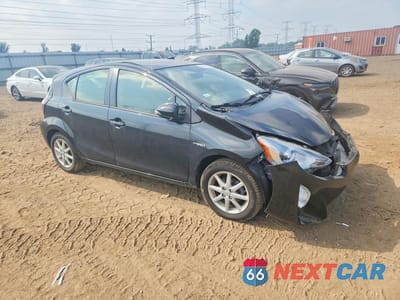 Czwarte zdjęcie samochodu z boku: 2015 TOYOTA PRIUS C FOUR VIN:JTDKDTB3XF1090590 - miniatura