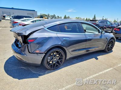 Trzecie zdjęcie samochodu z tyłu: 2018 TESLA MODEL 3 VIN:5YJ3E1EA9JF077622 - miniatura