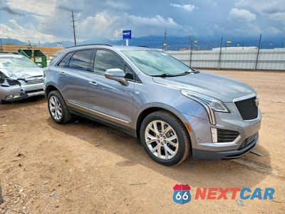 Czwarte zdjęcie samochodu z boku: 2020 CADILLAC XT5 SPORT VIN:1GYKNGRS2LZ144019 - miniatura