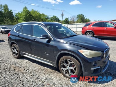 Czwarte zdjęcie samochodu z boku: 2016 BMW X1 XDRIVE28I VIN:WBXHT3C36GP881986 - miniatura