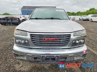 Piąte zdjęcie samochodu w środku: 2011 GMC CANYON SLE VIN:1GTE5MFE1B8125210 - miniatura
