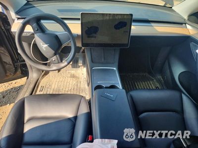 Zdjęcie 8 z 12 samochodu: 2023 TESLA MODEL Y VIN:7SAYGDEE8PF785571 - miniatura