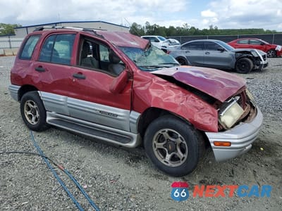 Czwarte zdjęcie samochodu z boku: 2001 CHEVROLET TRACKER LT VIN:2CNBJ634316948193 - miniatura