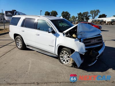 Czwarte zdjęcie samochodu z boku: 2018 GMC YUKON SLT VIN:1GKS2BKC8JR388649 - miniatura