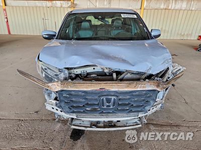 Piąte zdjęcie samochodu w środku: 2022 HONDA PASSPORT EXL VIN:5FNYF7H51NB000110 - miniatura