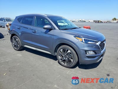 Czwarte zdjęcie samochodu z boku: 2019 HYUNDAI TUCSON SPORT VIN:KM8J33AL6KU041147 - miniatura