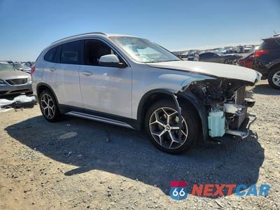 Czwarte zdjęcie samochodu z boku: 2018 BMW X1 SDRIVE28I VIN:WBXHU7C35J5L08889 - miniatura
