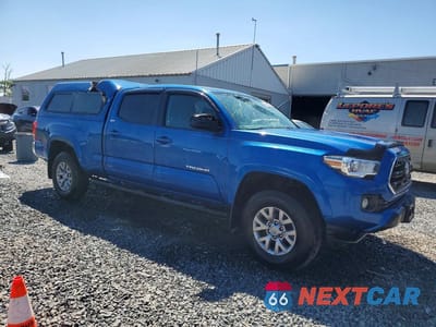 Czwarte zdjęcie samochodu z boku: 2017 TOYOTA TACOMA SR5 V6 VIN:3TMDZ5BN3HM035055 - miniatura