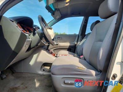 Zdjęcie 7 z 12 samochodu: 2006 TOYOTA HIGHLANDER HYBRID VIN:JTEEW21A560012866 - miniatura