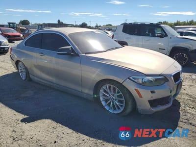 Czwarte zdjęcie samochodu z boku: 2014 BMW 228 I VIN:WBA1F5C51EV256131 - miniatura