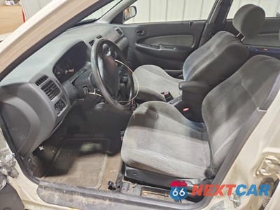 Zdjęcie 7 z 12 samochodu: 1997 MAZDA PROTEGE DX VIN:JM1BC1414V0145073 - miniatura