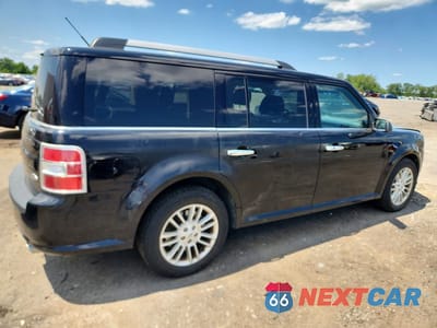 Trzecie zdjęcie samochodu z tyłu: 2016 FORD FLEX SEL VIN:2FMGK5C85GBA00202 - miniatura