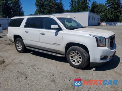 Czwarte zdjęcie samochodu z boku: 2015 GMC YUKON XL K1500 SLE VIN:1GKS2GKC0FR651351 - miniatura