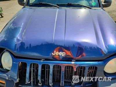 Zdjęcie 11 z 12 samochodu: 2002 JEEP LIBERTY SPORT VIN:1J4GL48K72W249778 - miniatura