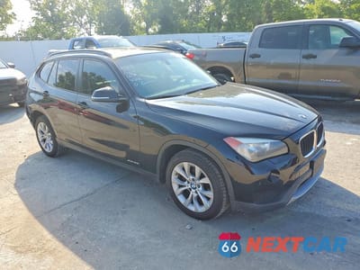 Czwarte zdjęcie samochodu z boku: 2014 BMW X1 XDRIVE28I VIN:WBAVL1C50EVY18071 - miniatura