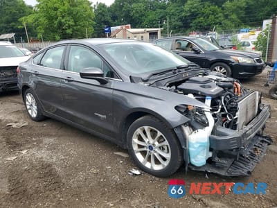 Czwarte zdjęcie samochodu z boku: 2019 FORD FUSION SE VIN:3FA6P0LU3KR241421 - miniatura