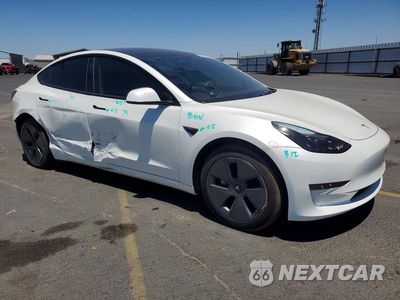Czwarte zdjęcie samochodu z boku: 2023 TESLA MODEL 3 VIN:5YJ3E1EA2PF562791 - miniatura