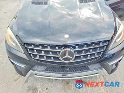 Zdjęcie 12 z 14 samochodu: 2015 MERCEDES-BENZ ML 400 4MATIC VIN:4JGDA5GB1FA482687 - miniatura