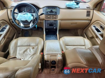 Zdjęcie 8 z 13 samochodu: 2004 HONDA PILOT EXL VIN:2HKYF18554H549631 - miniatura