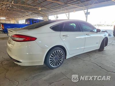 Trzecie zdjęcie samochodu z tyłu: 2017 FORD FUSION TITANIUM PHEV VIN:3FA6P0SU6HR354192 - miniatura