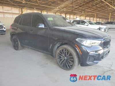 Czwarte zdjęcie samochodu z boku: 2020 BMW X5 M50I VIN:5UXJU4C05L9B94196 - miniatura