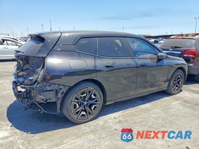 Trzecie zdjęcie samochodu z tyłu: 2024 BMW IX XDRIVE50 VIN:WB523CF03RCN40748 - miniatura
